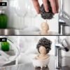 Bathtub shaped cleaning ball